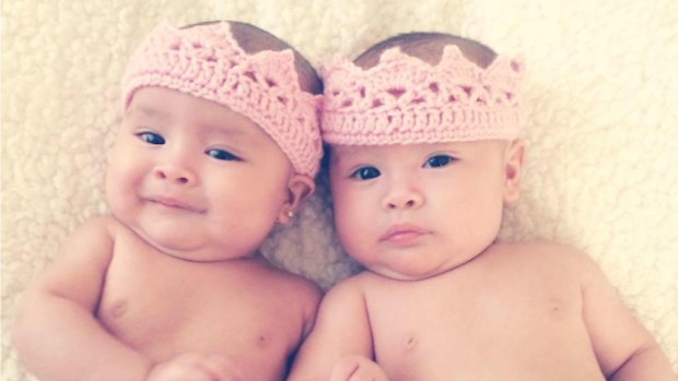 Kayla and Kiara were born deaf and on Wednesday heard their mother's voice for the first time. (Facebook)