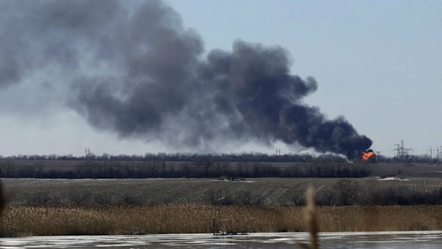 An explosion is seen from a shelled gas pipe near a power station, not far from Debaltseve in Ukraine. (AAP)
