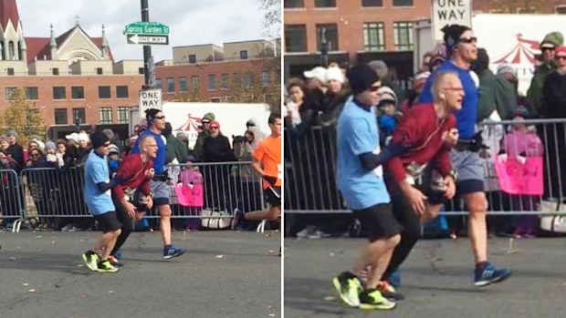 Two US marathon runners were seen helping a collapsed man finish the race. (Facebook/Chelsea Coyle/Love What Matters)