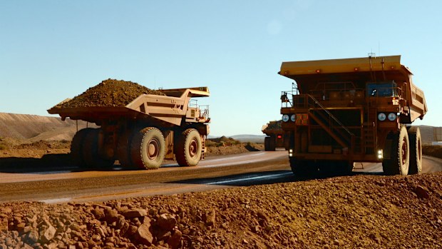 Giant transport trucks at a mine in Australia. (AAP)