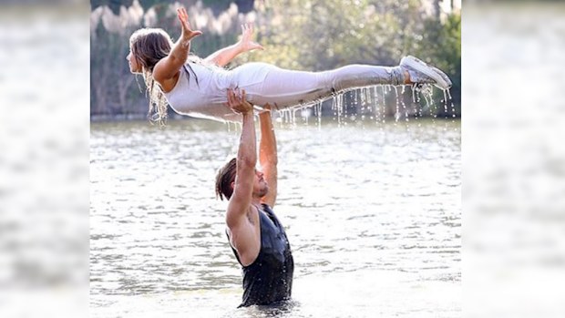 Bindi Irwin and Derek Hough performing the famous lift. (Instagram / @derekhough)