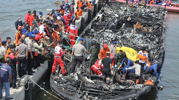 At least 23 people have been killed and 17 others are missing after a ferry in Indonesia went up in flames. (AAP)