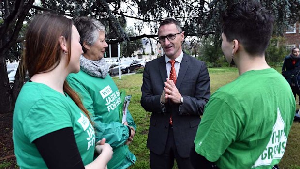 Greens leader Richard Di Natale speaks with volunteers at a pre-polling booth in the federal seat of Higgins in Malvern. (AAP)