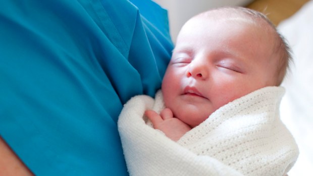 Welcome to the world little one. Meet your midwife. She helped to bring you here. Image: Getty.