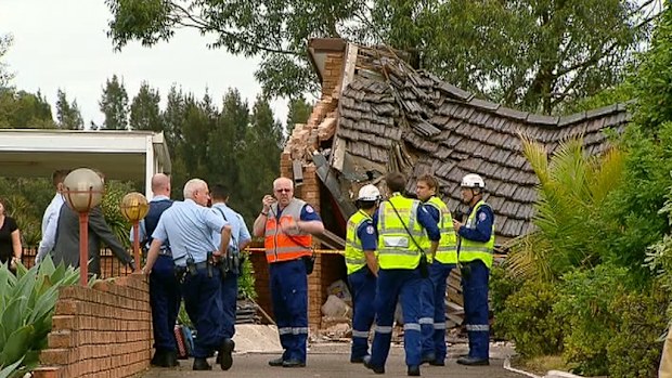 Emergency crews at the scene on Walker Street. (9NEWS)