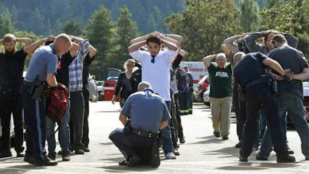 Police search students at a campus. (File image)