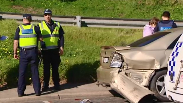 Police stand by one of the vehicles involved in the fatal accident at Frankston. Picture: 9NEWS
