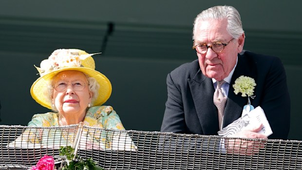 John Warren, Queen Elizabeth II and Lord Samuel Vestey watch the racing as they attend Derby Day during the Investec Derby Festival at Epsom Racecourse on June 3, 2017 in Epsom, England.