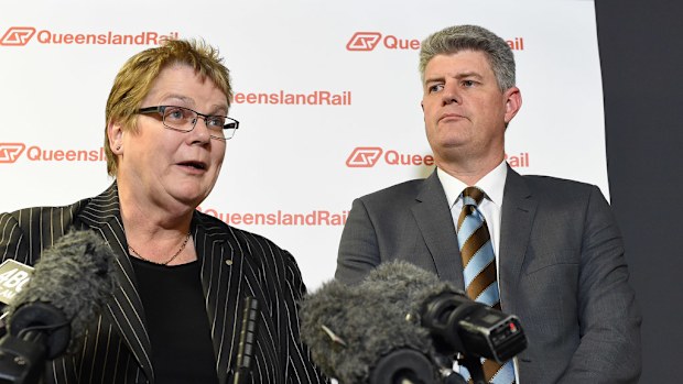 Queensland Rail CEO, Helen Gluer (L) and Queensland Minister for Transport and the Commonwealth Games, Stirling Hinchliffe at a press conference in Brisbane on October 24, 2016. (AAP)
