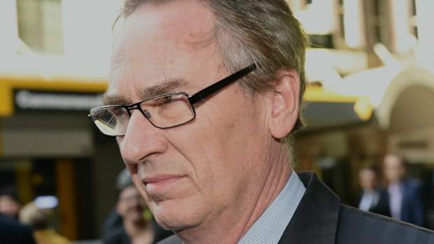 Londonderry MP, Bart Bassett, departs after giving evidence at the ICAC. (AAP Image/Paul Miller)