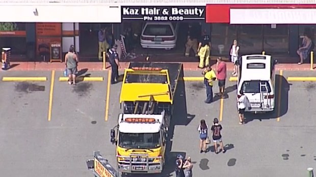 A car crashed into a shop at Bray Park, north of Brisbane. (9NEWS)