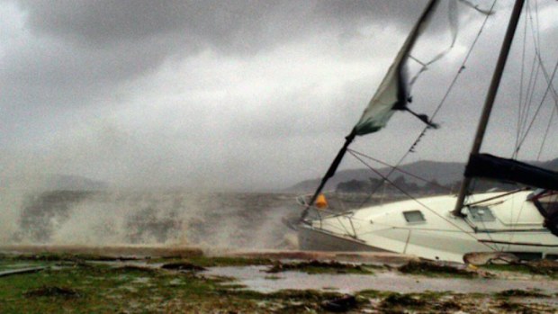 A boat being battered by the storms at Gosford. (Tamara Dare)