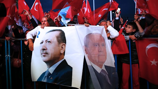 "Yes" supporters celebrate their victory in front of Justice and Development AK Party's provincial headquarters after early results as vote counting continues following the constitutional referendum on April 16, 2017 in Antalya, Turkey. (AFP)