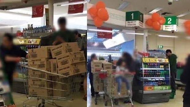 Mum of two Jessica Hay witnesses a group buy trolleys full of baby formula at Woolworths, Epping Plaza, despite the supermarket's eight tin limit. (Facebook)