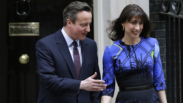 David Cameron leaves 10 Downing Street with his wife Samantha on his way to meet with the Queen where he will be formally invited to make a new government. (AAP)