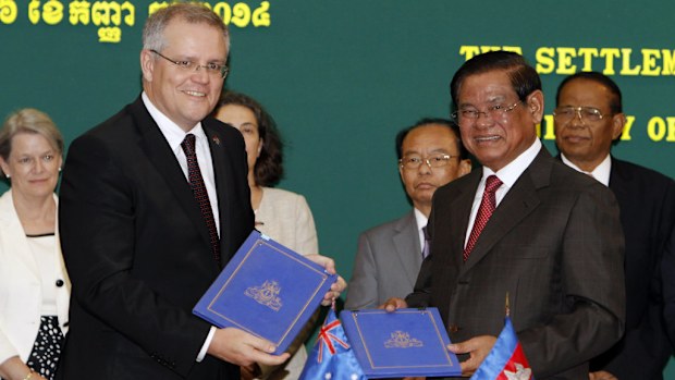 Former Immigration Minister Scott Morrison with Cambodian Interior Minister Sar Kheng confirmed the deal in September of last year. (AAP)