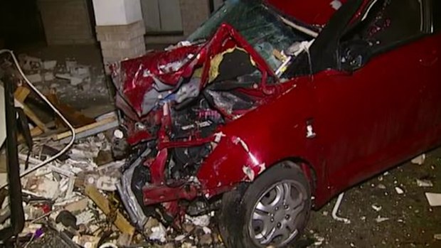 Man in hospital with minor injuries after ploughing through Brisbane home. (9NEWS) 