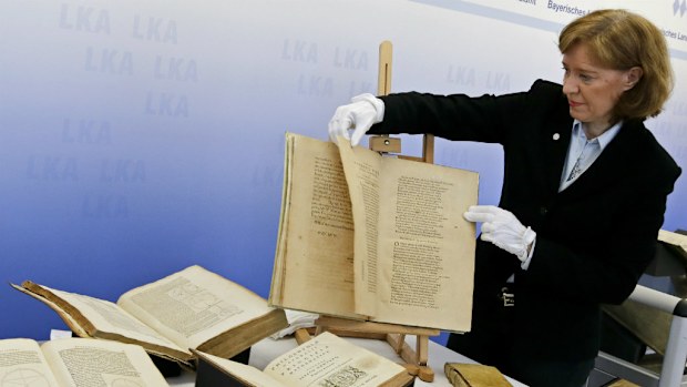 German authorities have recovered hundreds of stolen rare books, including some by Galileo, from a Munich auction house. (AAP)