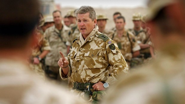 British Colonel Tim Collins (pictured during the Iraq War in 2003) has called for military action in Iraq. (AAP)