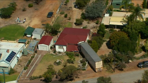 The prime mover smashed into the woman's bedroom. (9NEWS)