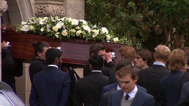 The casket was carried by six of Stuart's close friends. (9NEWS)