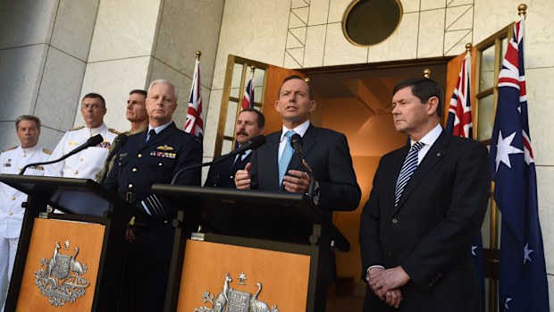 Prime Minister Tony Abbott and Defence Minister Kevin Andrews announce the appointment of the new Chief of Army and Chief of Air Force during a press conference at Parliament House in Canberra. (AAP)