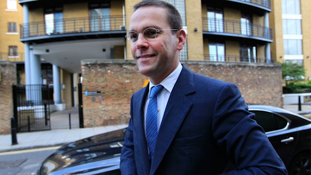 James Murdoch arrives at News International headquarters in London. (AAP)