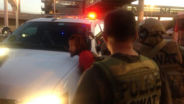 Police arrest the third suspect after a shooting at Tempe. (Twitter)