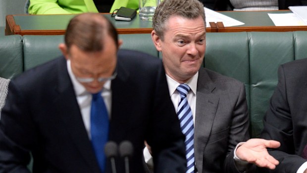 Christopher Pyne sits behind Tony Abbott in parliament. (AAP)