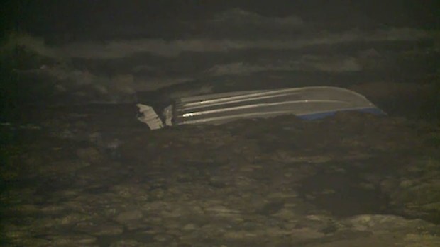 The overturned boat. (9NEWS)