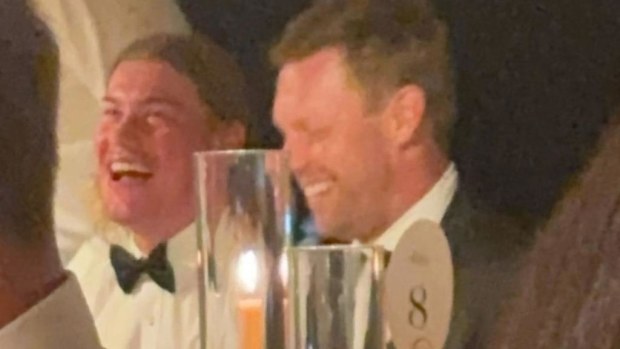 Harley Reid and Sam Mitchell sat together at former Eagle-turned-Hawk Tom Barrass' wedding.