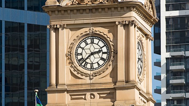 Sydney's Town Hall clock. NSW is one of several states that will be setting their clocks forward by one hour tomorrow. (Getty)