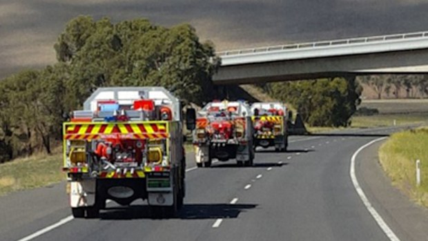 NSW Rural Fire Service trucks en route to the Tasmania bushfires. (Twitter / @NSWRFS)