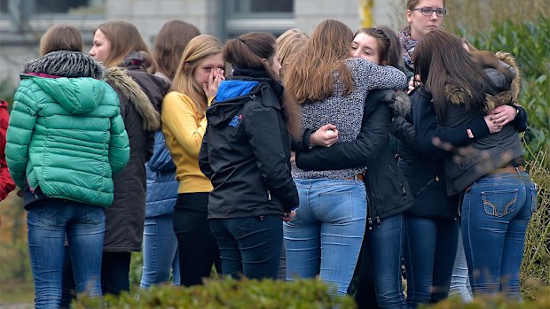 Students mourn in front of the Joseph-Koenig Gymnasium. (AAP)