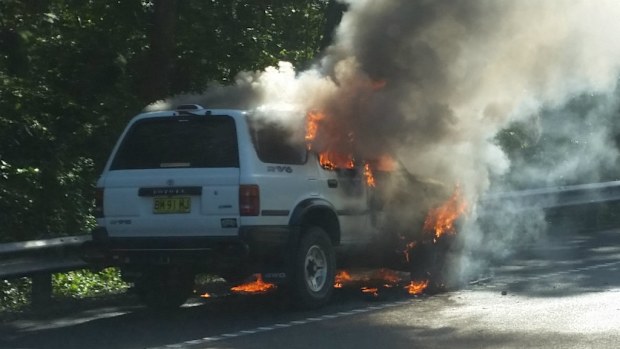 The driver of this car walked away unscathed after fire took hold of his vehicle. (Supplied)