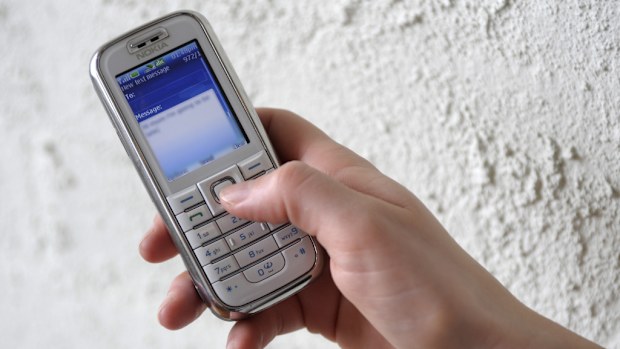 The worker was fired by text. (AAP file image)