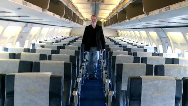 Nigel Short on board an Air Zimbabwe 737