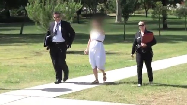 Lexy Jamieson attends a police station to be charged earlier this week. (9NEWS)