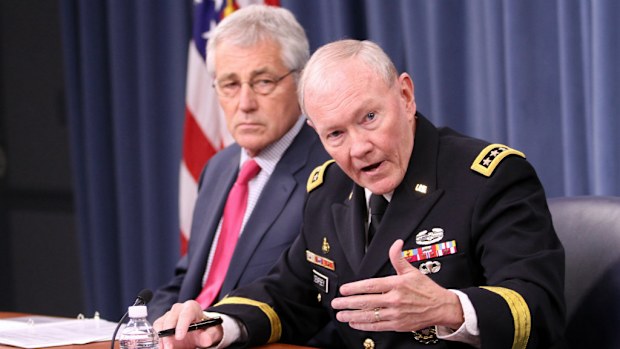 General Martin Dempsey (right) with US Secretary of Defense Chuck Hagel. (Getty)