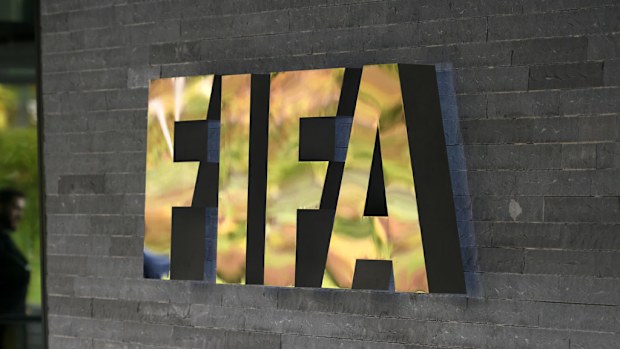 A FIFA sign at the entrance of the world football's governing body headquarters in Zurich. (AFP)
