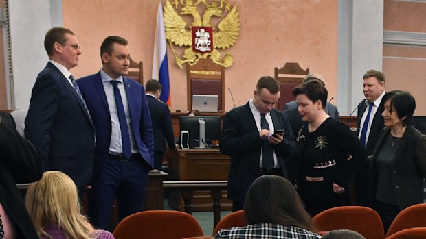 Participants attend a hearing on the justice ministry request to ban the Jehovah's Witnesses at Russia's Supreme Court in Moscow on April 20, 2017. (AFP)