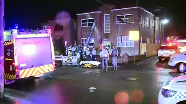 Firefighters were called to a burning Ashfield unit. (9NEWS)