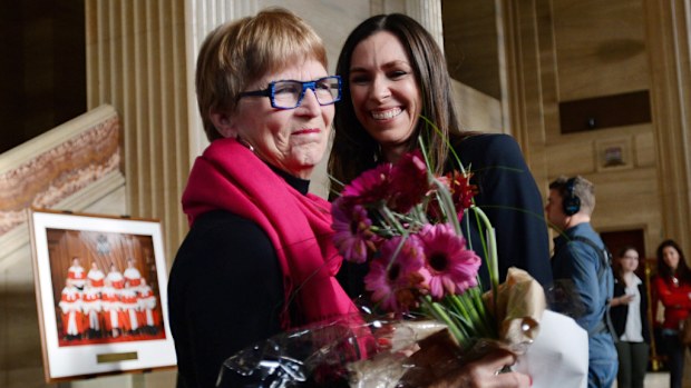 Lee Carter and Grace Pastine, litigation director of the British Columbia Civil Liberties Association, celebrate inside the Supreme Court. (AAP)