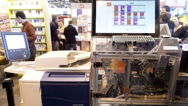 The book printer is on display at the "Salon du Livre" International Book Fair. (AFP)