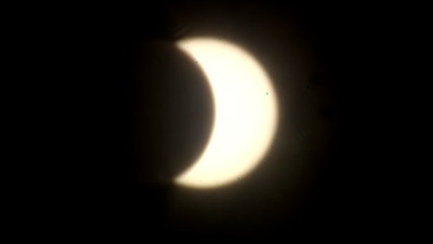 The partial eclipse, seen over Darwin,