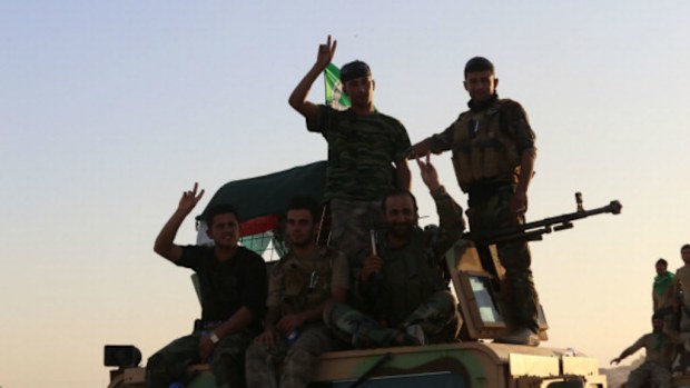 Peshmerga forces, supported by People's Protection Units outside Arbil. (Getty Images)