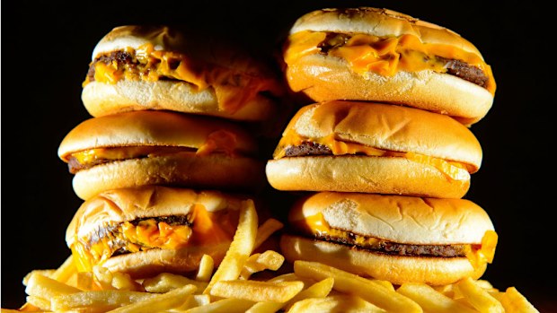 Australians' consumption of junk food needs to be halved, the study has found. (AAP)