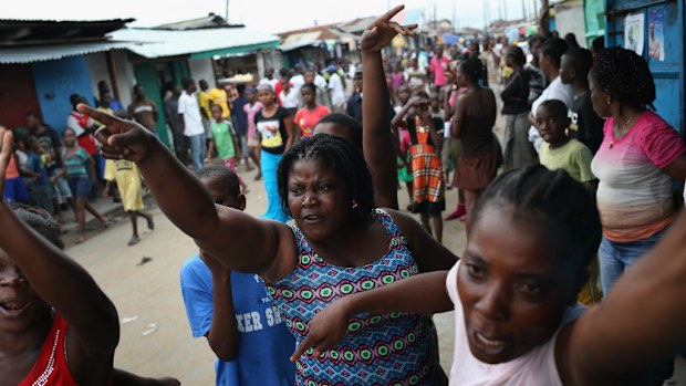 A number of Monrovia residents have taken to the streets against the Liberian government's anti-Ebola measures. (Getty)