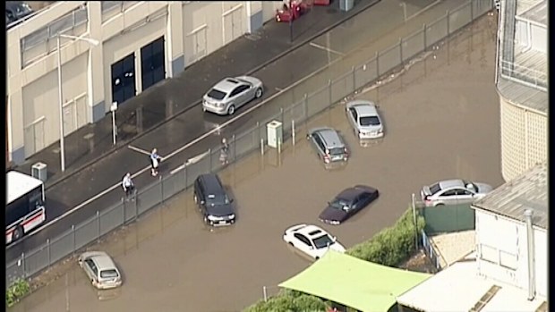 Cars float in the streets of Geelong.