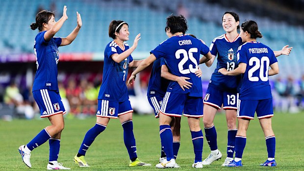 Japan celebrates their semi-final win.
